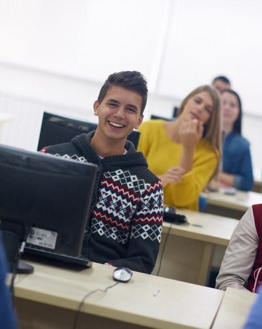 technology students group in computer lab classroom-1